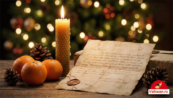 горящая свеча и записка с желанием